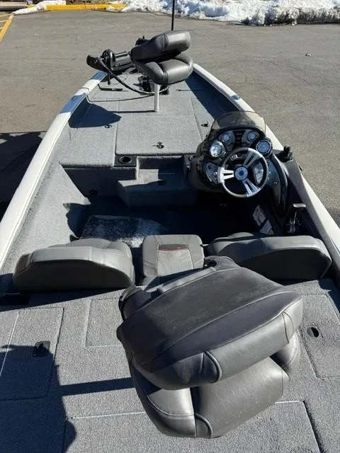 Slide: The Image of 2022 Tracker PRO175TE boat interior with steering console and seating. - 8
