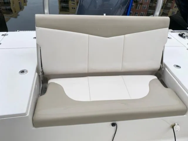 Slide: The Image of 2016 Robalo 226 Cayman boat seat with beige and white upholstery. - 12