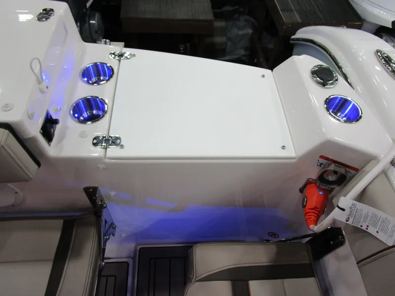 Slide: The Image of 2025 Cutwater C-248 Coupe interior with cup holders and seating area. - 14