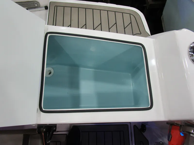 Slide: The Image of Open storage compartment on 2025 Cutwater C-248 Coupe boat. - 15