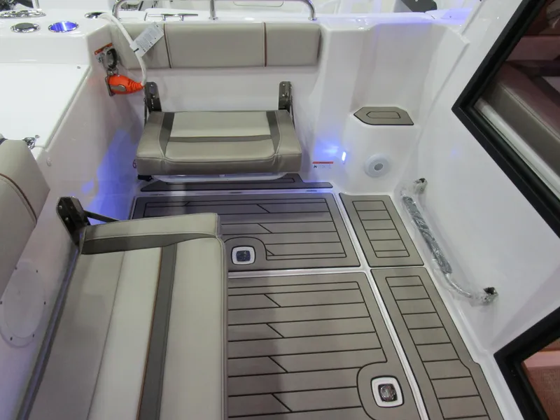 Slide: The Image of 2025 Cutwater C-248 Coupe interior with cushioned seating and modern flooring. - 16