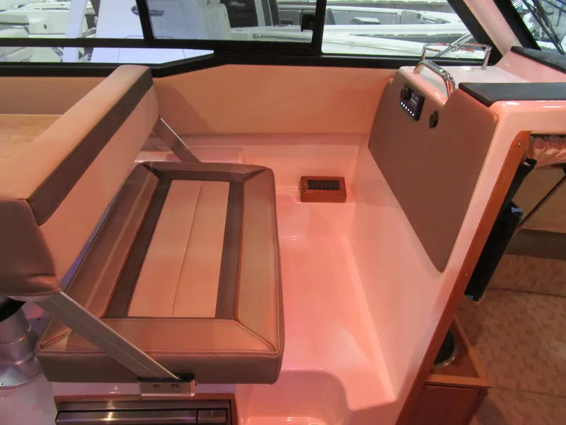 Slide: The Image of Interior seating of 2025 Cutwater C-248 Coupe boat, featuring modern design and comfortable upholstery. - 21