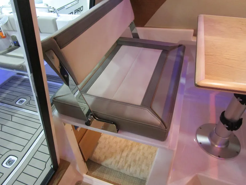 Slide: The Image of 2025 Cutwater C-248 Coupe interior seating and table detail. - 35