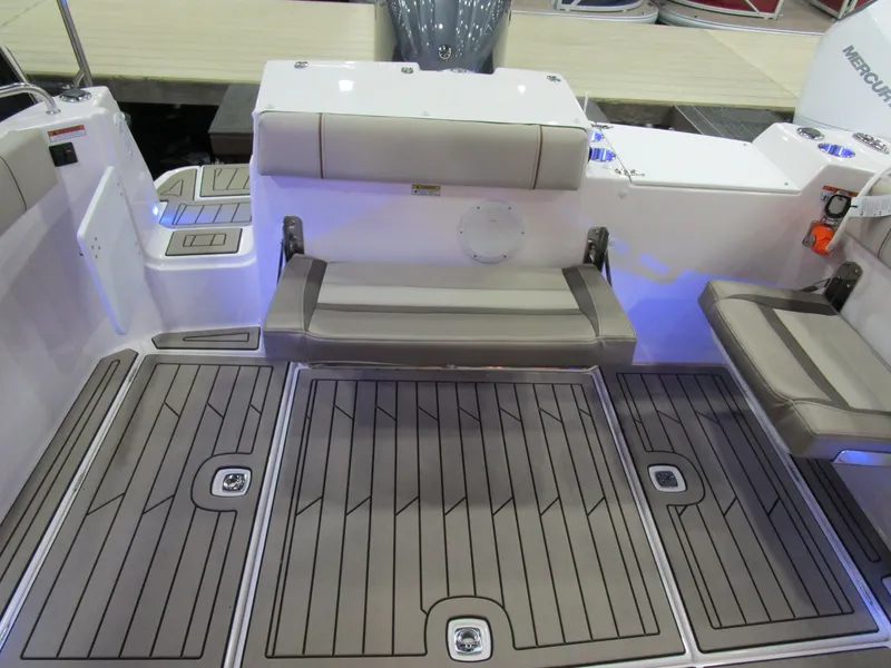 Slide: The Image of 2025 Cutwater C-248 Coupe boat interior with cushioned seating and non-slip flooring. - 38