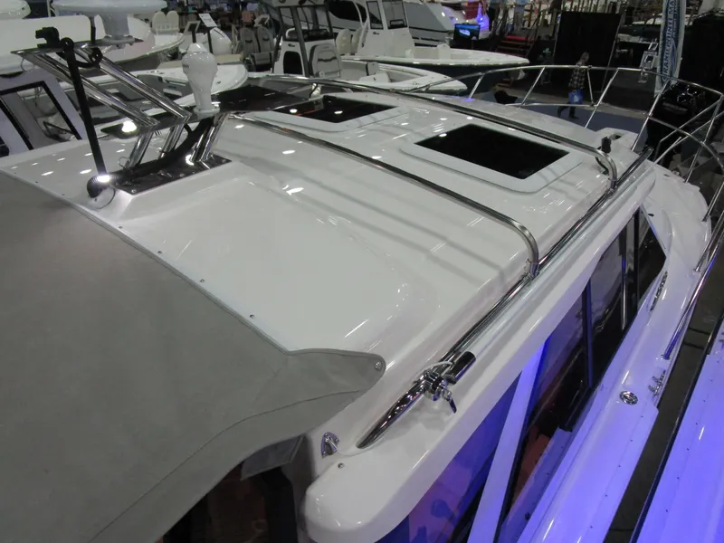 Slide: The Image of 2025 Cutwater C-248 Coupe boat roof with sleek design and modern features. - 39