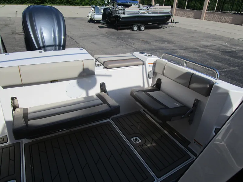 Slide: The Image of 2025 Cutwater C-248 Coupe boat interior with foldable seating and sleek design. - 48
