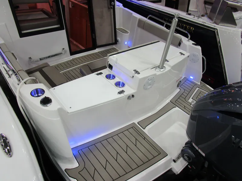 Slide: The Image of 2025 Cutwater C-248 Coupe boat interior with seating and modern design. - 7