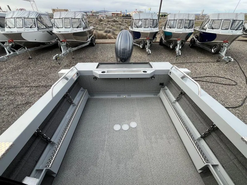 Slide: The Image of 2024 Hewescraft 200 ProV ET HT boat interior with motor, surrounded by similar models. - 8