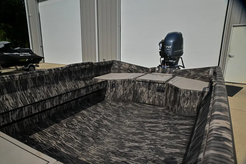 Slide: The Image of 2024 Reaper Boats TIMBER REAPER 756 with camo interior and powerful outboard motor. - 3