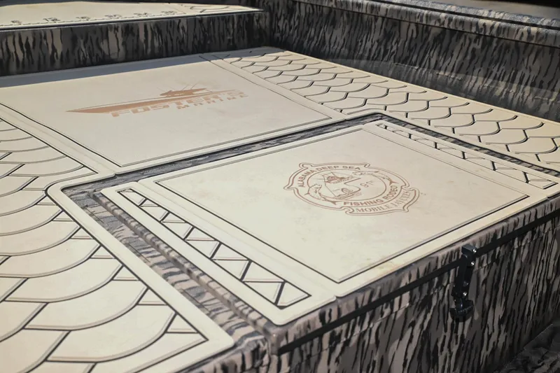 Slide: The Image of 2024 Reaper Boats TIMBER REAPER 756 deck with intricate design and logo detailing. - 6