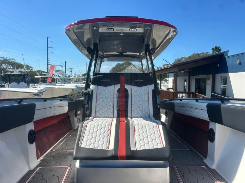 Slide: The Image of 2021 Fountain 38SC boat interior with stylish seating and modern design. - 14