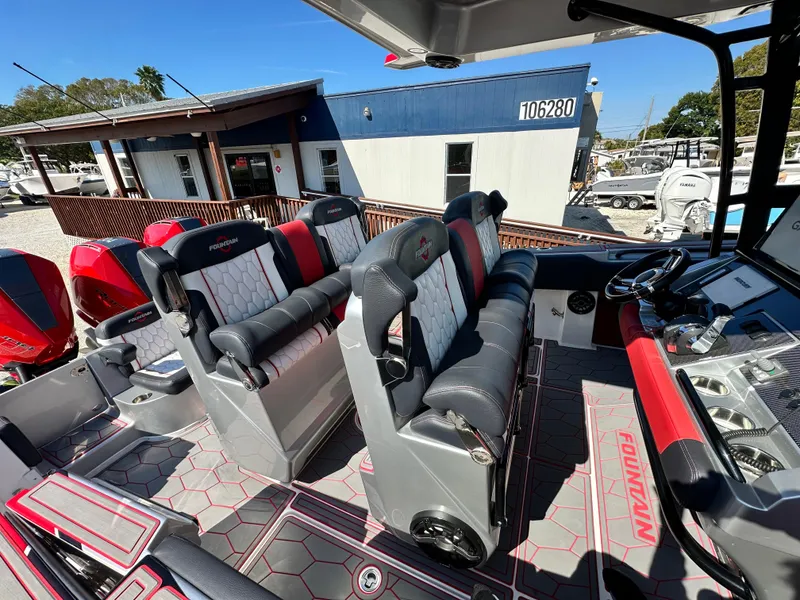 Slide: The Image of 2021 Fountain 38SC boat interior with modern seating and control panel. - 23