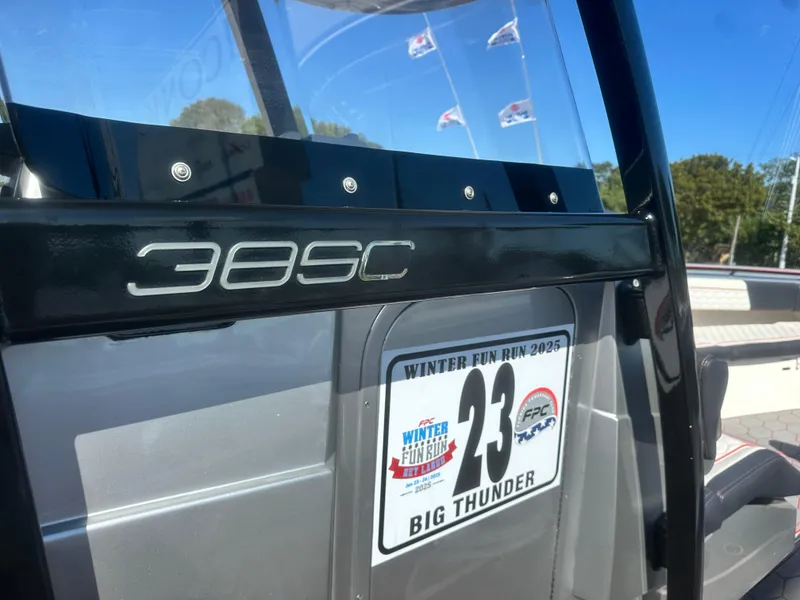 Slide: The Image of 2021 Fountain 38SC boat at Winter Fun Run event, featuring "Big Thunder" label. - 33