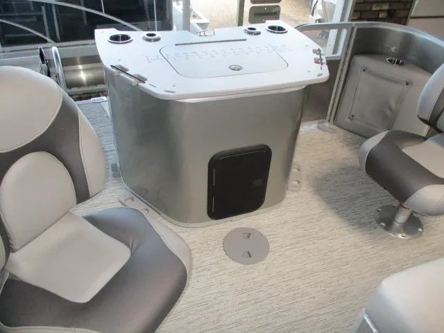 Slide: The Image of Interior of 2025 Bennington 23SXS STERN FISH boat with seating and fishing station. - 5