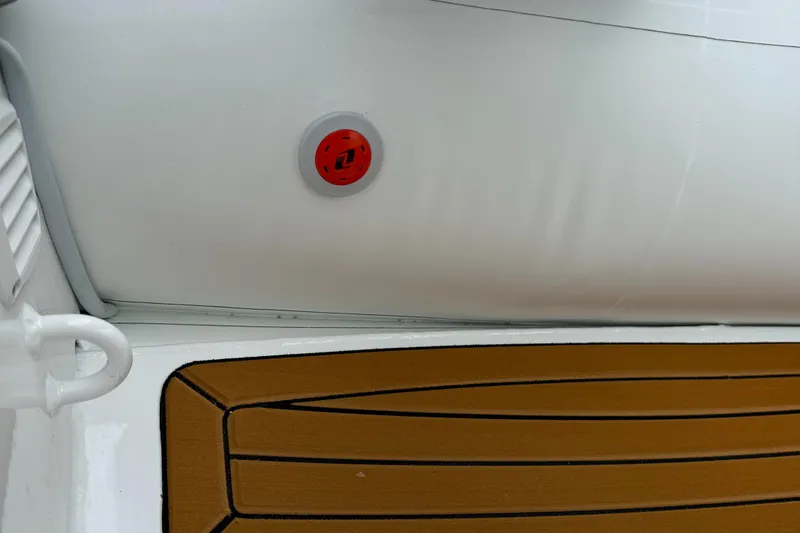Slide: The Image of Close-up of Gala A300Q 2025 boat interior with red valve and wooden flooring. - 3