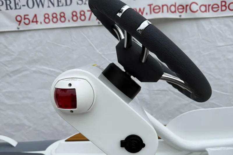 Slide: The Image of Steering wheel of 2025 Gala A300Q boat, featuring modern design and controls. - 4