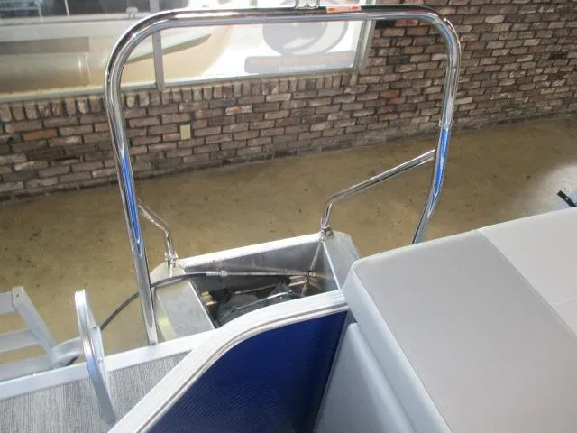 Slide: The Image of 2025 Bennington 20S boat interior with chrome railing and cushioned seating. - 5