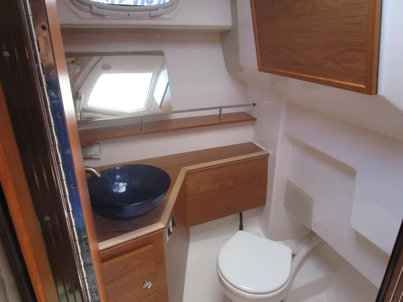 Slide: The Image of 2025 Cutwater C-288 Coupe interior seating with modern design and sleek finishes. - 29