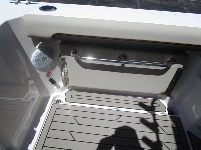 Slide: The Image of 2025 Cutwater C-288 Coupe interior with navigation system and cozy seating area. - 31