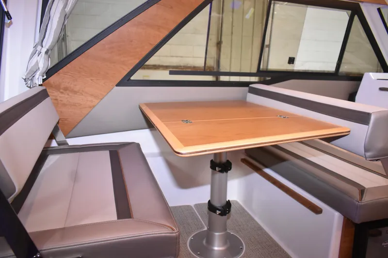 Slide: The Image of Luxurious interior of 2025 Cutwater C-288 Coupe boat with cozy bedding and modern design. - 34