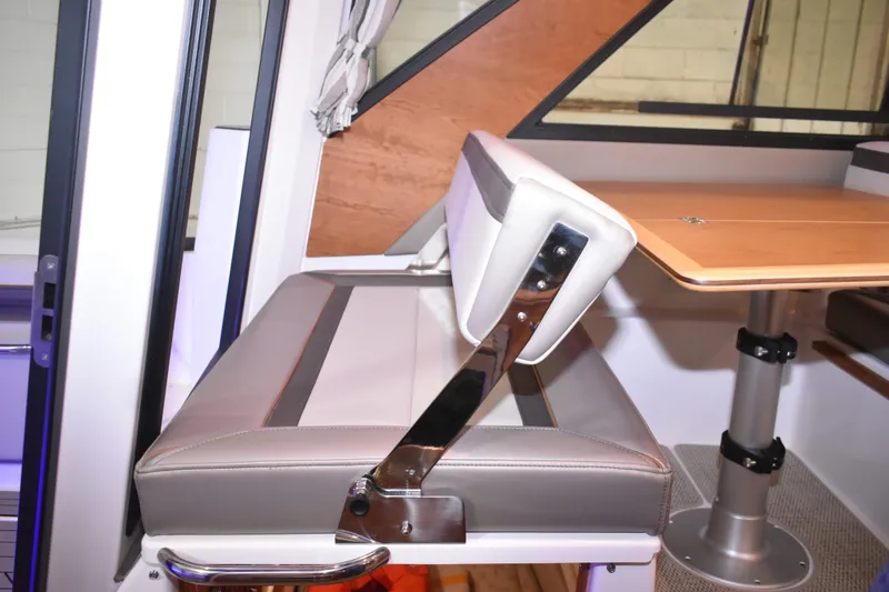 Slide: The Image of Luxurious interior of 2025 Cutwater C-288 Coupe with cozy bed and mounted TV. - 35