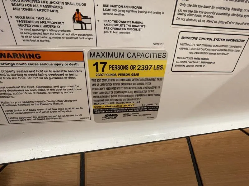 Slide: The Image of Maximum capacity label for 2025 Malibu 24 MXZ: 17 persons or 2397 lbs. - 21