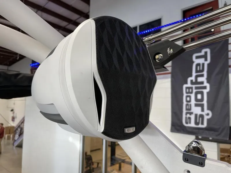 Slide: The Image of 2025 Malibu 24 MXZ boat speaker detail at Taylor's Boats showroom. - 30