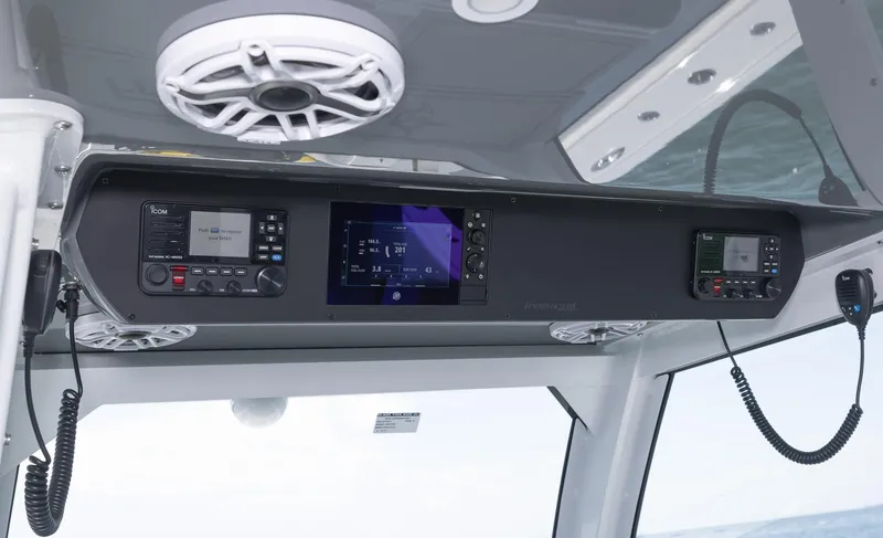 Slide: The Image of 2024 Freeman 47 boat dashboard with modern navigation and communication systems. - 31