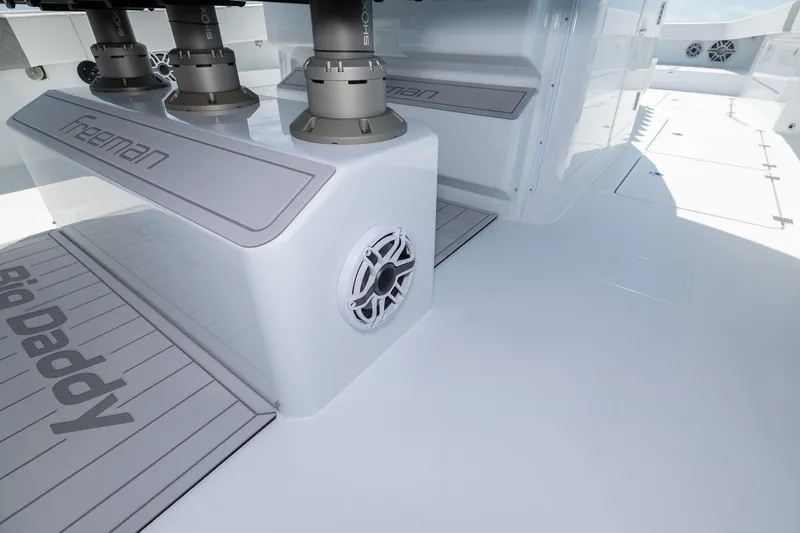 Slide: The Image of Freeman 47 boat interior, 2024 model, featuring sleek design and integrated speaker system. - 39