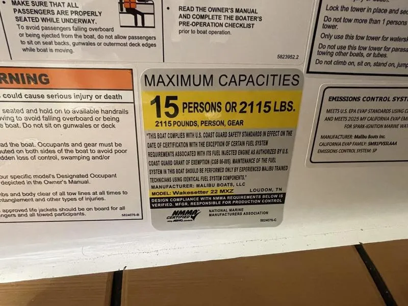 Slide: The Image of 2025 Malibu 22 MXZ capacity label: 15 persons or 2115 lbs maximum. - 19