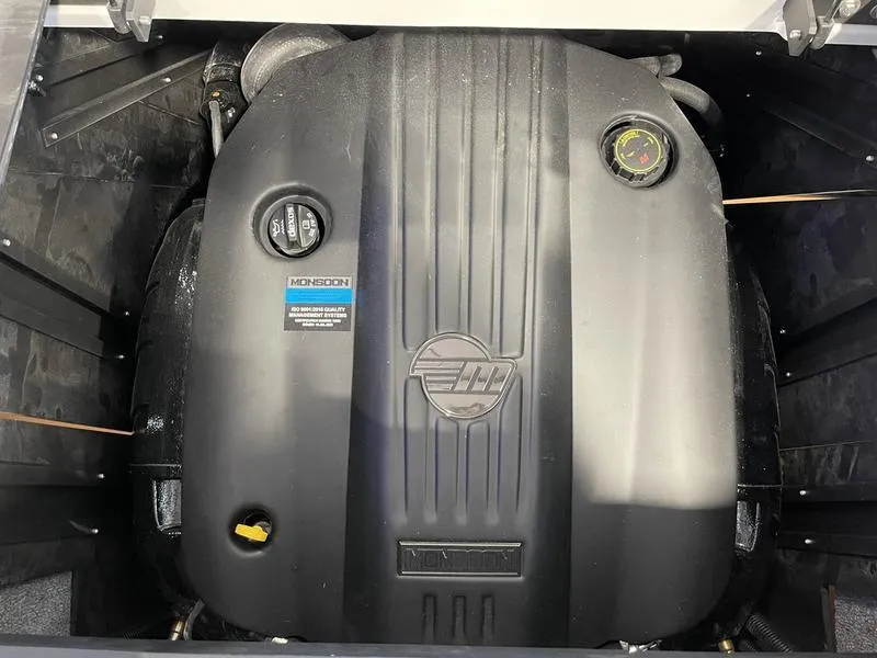 Slide: The Image of 2025 Malibu 22 MXZ engine compartment with Monsoon engine cover. - 3