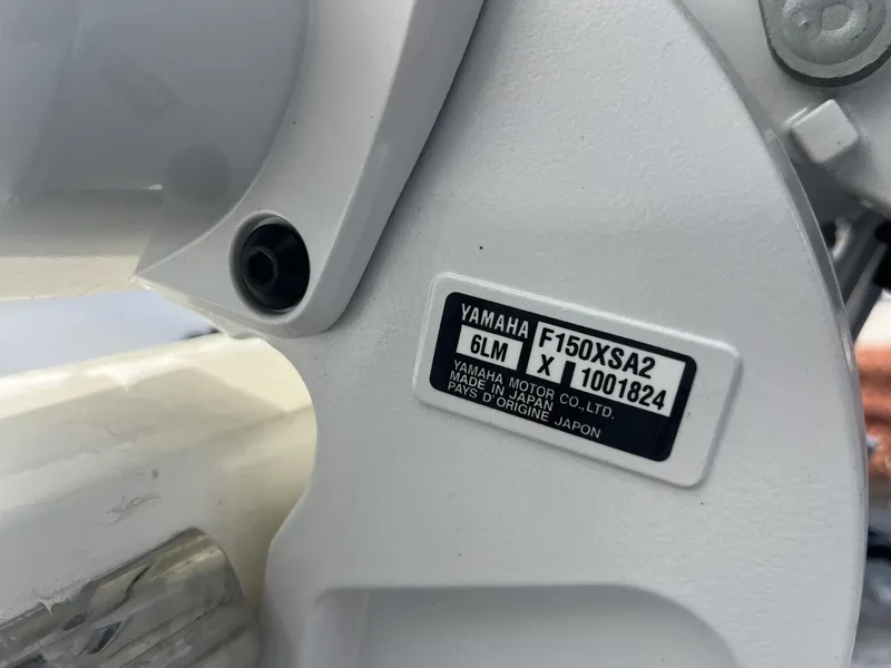Slide: The Image of Close-up of Yamaha motor label on 2025 Cobia 240 CC boat. - 10