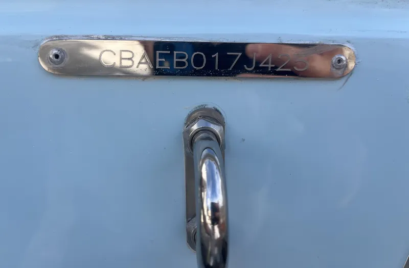 Slide: The Image of 2025 Cobia 240 CC boat hull identification number plate. - 8