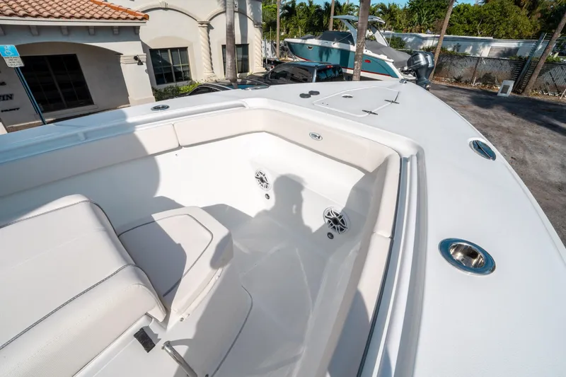 Slide: The Image of 2025 Sea Hunt GAMEFISH 27 CB boat interior with seating and cup holders. - 35