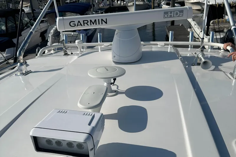 Slide: The Image of 2019 Pursuit OS 355 Offshore boat with Garmin xHD2 radar on deck. - 10
