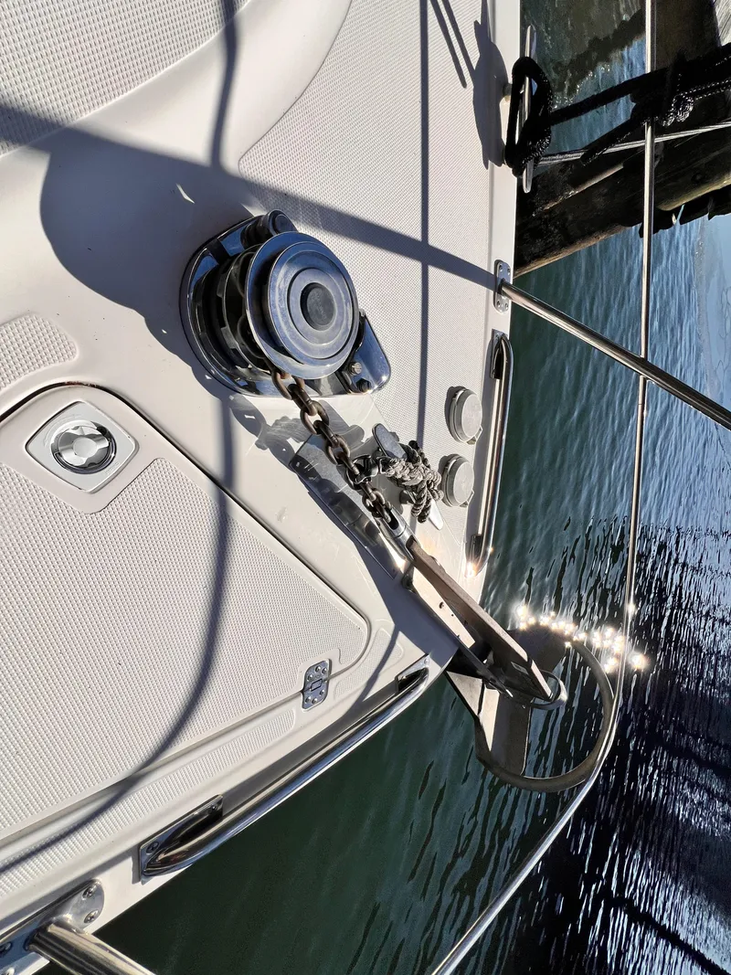 Slide: The Image of Anchor and chain on 2005 Carver 444 Cockpit Motor Yacht deck. - 19