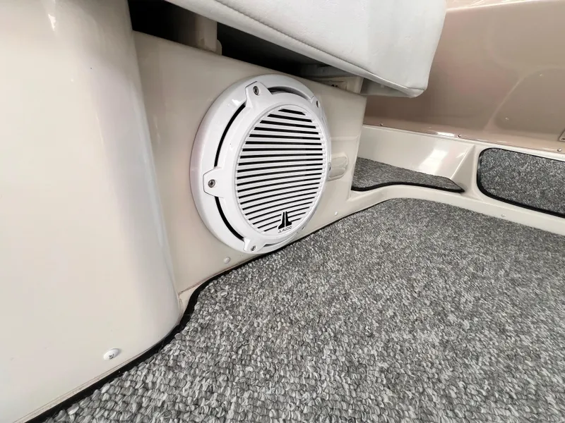 Slide: The Image of Speaker installed in 2005 Carver 444 Cockpit Motor Yacht interior, featuring carpeted flooring. - 21