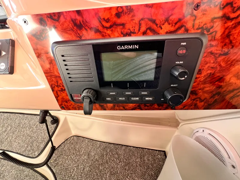 Slide: The Image of Garmin marine radio on 2005 Carver 444 Cockpit Motor Yacht dashboard. - 29