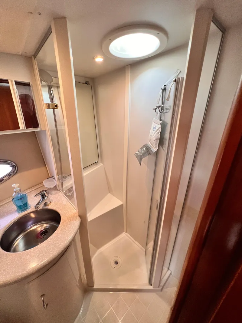 Slide: The Image of Bathroom interior of 2005 Carver 444 Cockpit Motor Yacht with shower and sink. - 39