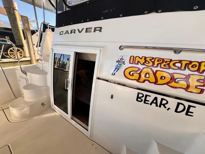 Slide: The Image of 2005 Carver 444 Cockpit Motor Yacht with "Inspector Gadget" decal, docked in Bear, DE. - 6