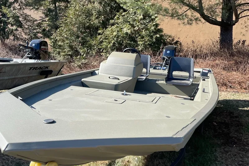 Slide: The Image of 2023 Tracker Grizzly 1754 boat in a natural outdoor setting. - 4