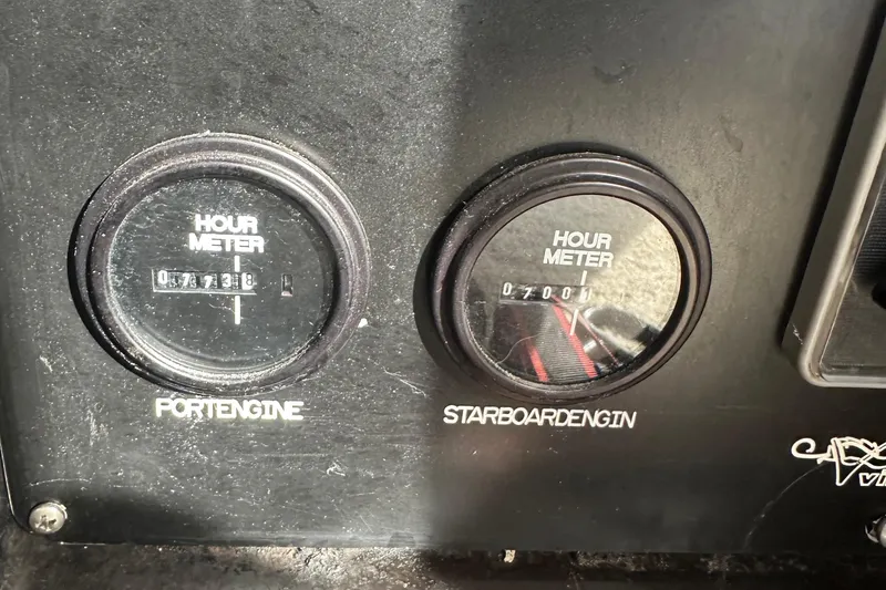 Slide: The Image of Hour meters for port and starboard engines on a 1978 Viking Boats 35. - 10