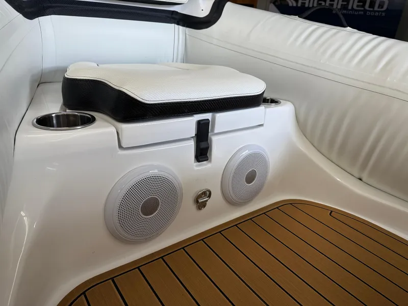 Slide: The Image of Walker Bay Generation 14 LTE 2025 boat interior with speakers and cushioned seating. - 13
