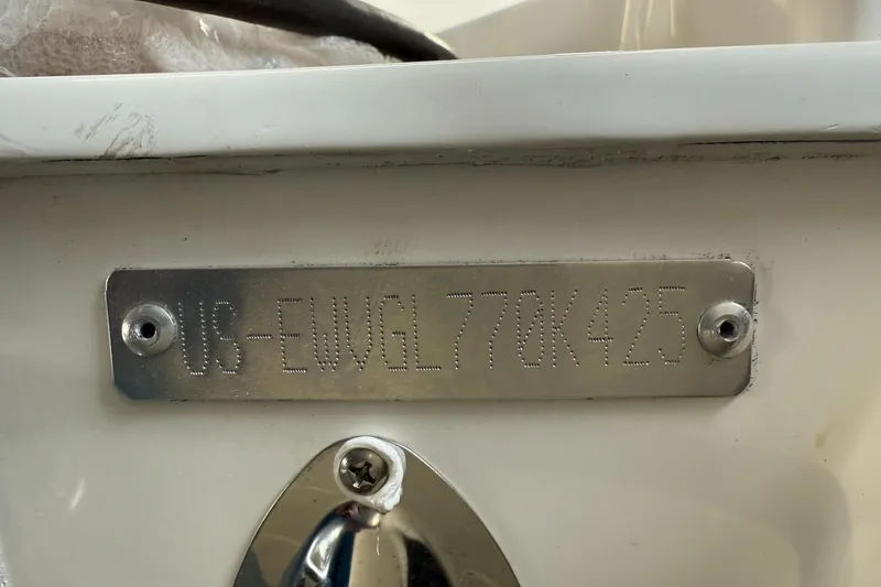 Slide: The Image of 2025 Walker Bay Generation 14 LTE boat identification plate with engraved serial number. - 18