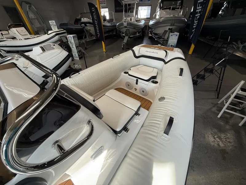 Slide: The Image of 2025 Walker Bay Generation 14 LTE inflatable boat displayed in a showroom. - 4
