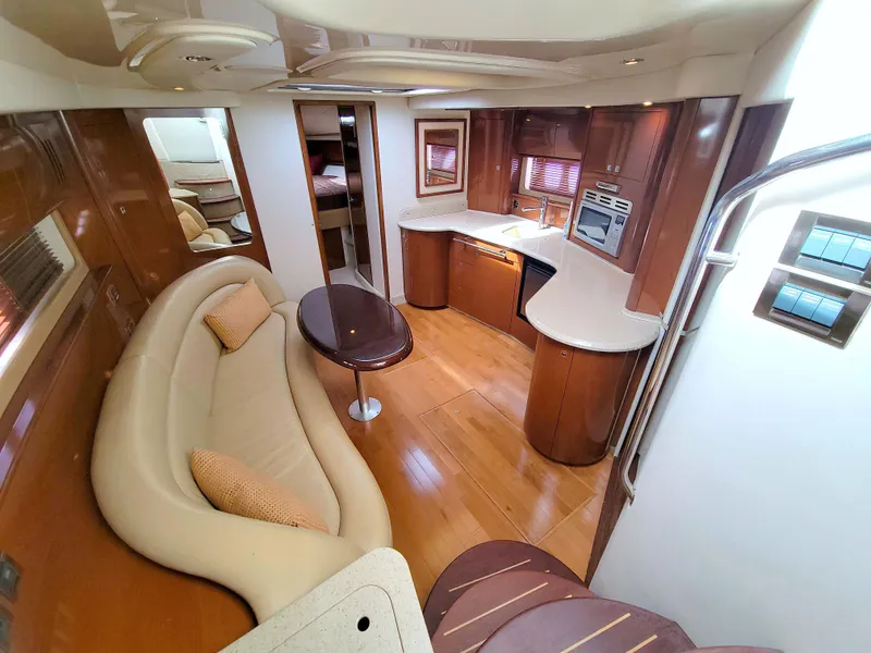 Slide: The Image of Luxurious interior of a 2009 Sea Ray 44 Sundancer yacht with elegant wood finishes. - 33