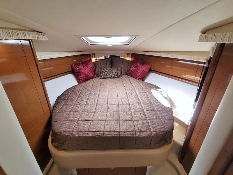 Slide: The Image of Luxurious cabin interior of 2009 Sea Ray 44 Sundancer yacht with cozy bedding. - 43