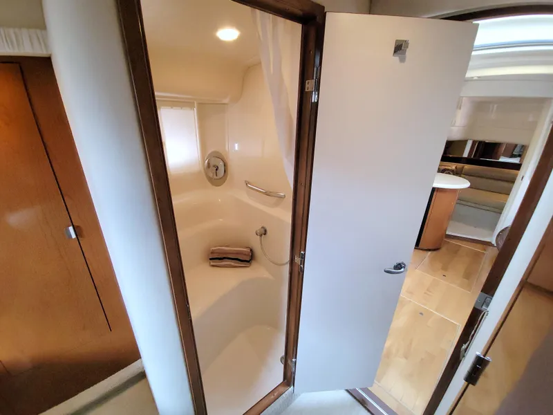 Slide: The Image of Shower area inside 2009 Sea Ray 44 Sundancer yacht, featuring sleek design and modern amenities. - 47