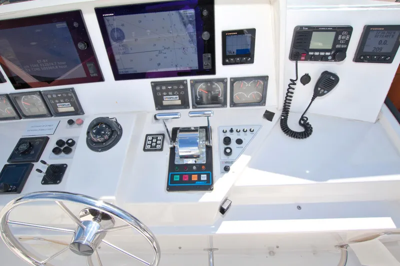 Slide: The Image of Control panel of a 1999 West Bay 58 Sonship yacht with navigation and communication equipment. - 31
