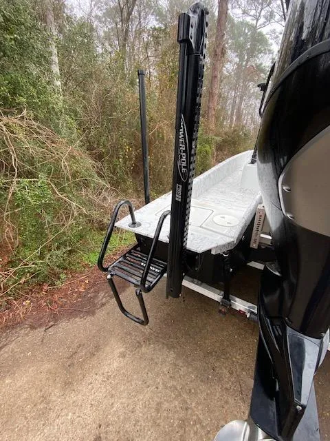 Slide: The Image of 2023 Dargel 250Kat HDX boat with Power-Pole anchor system in wooded area. - 10